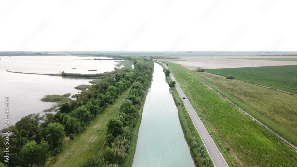 Aerial view Bibione lagoon descent on the Lugugnana canal Aerial view Bibione lagoon descent on the Lugugnana canal