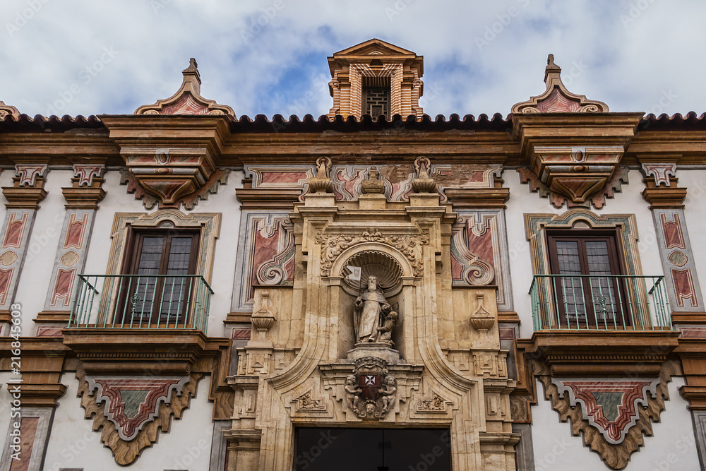 Architectural fragments of Baroque Palacio de la Merced in Cordoba Plaza de Colon. Palacio de la Merced was built in XVIII century; it was monastery of Mercedarian monks. Andalusia, Cordoba, Spain.