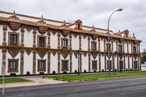 Architectural fragments of Baroque Palacio de la Merced in Cordoba Plaza de Colon. Palacio de la Merced was built in XVIII century; it was monastery of Mercedarian monks. Andalusia, Cordoba, Spain. photo