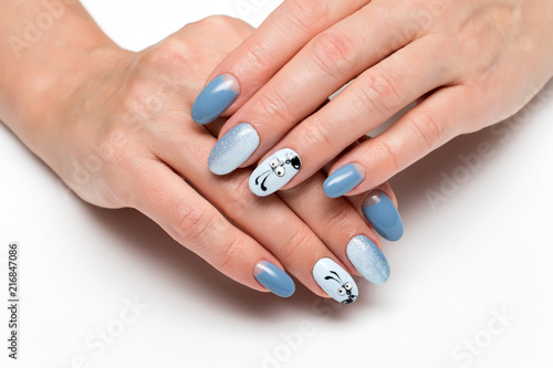 summer blue manicure with sequins on long oval nails with painted ant