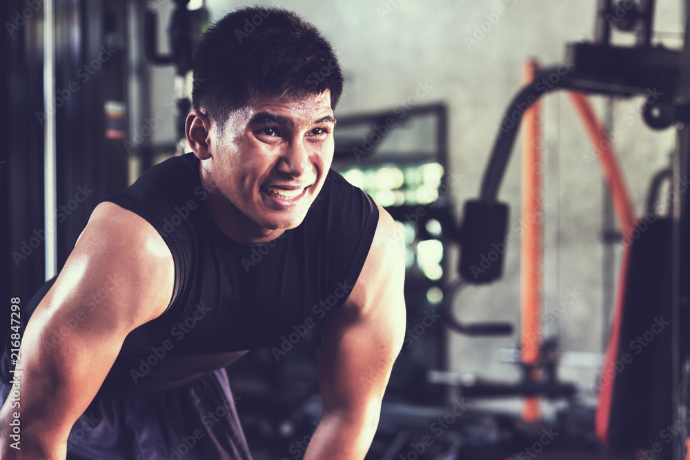 Fototapeta premium healthy people workout and building body at gym