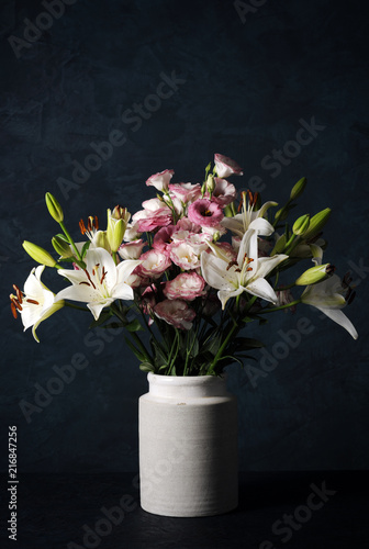 Fototapeta Naklejka Na Ścianę i Meble -  beautiful flowers on dark blue background