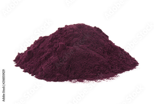 Pile of acai powder on white background photo