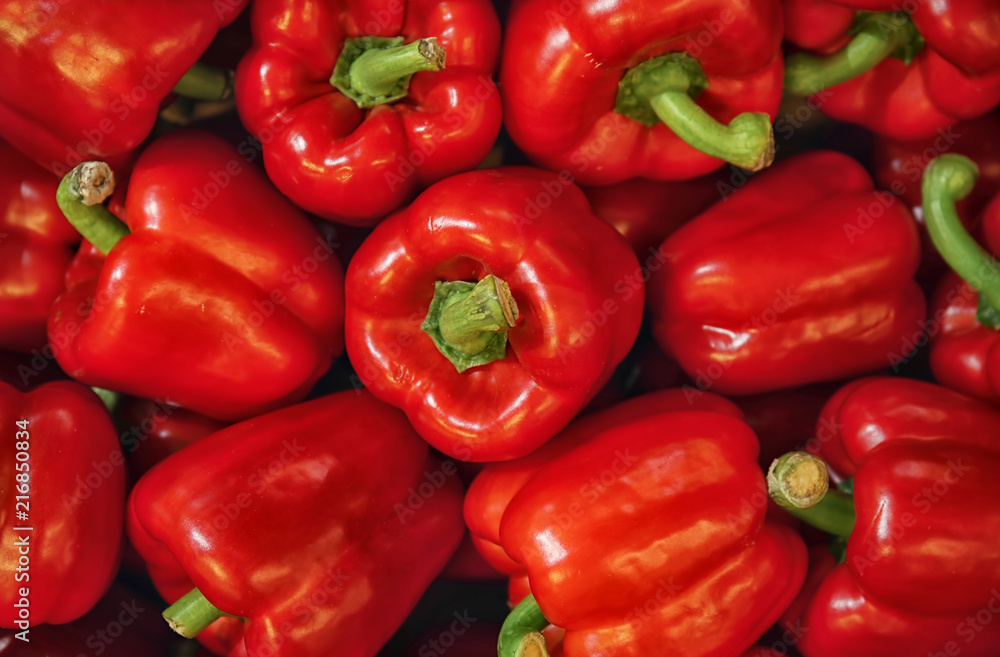 Pile of paprika peppers as background, closeup Pile of paprika peppers as background, closeup