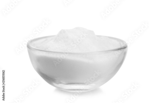 Bowl with baking soda on white background