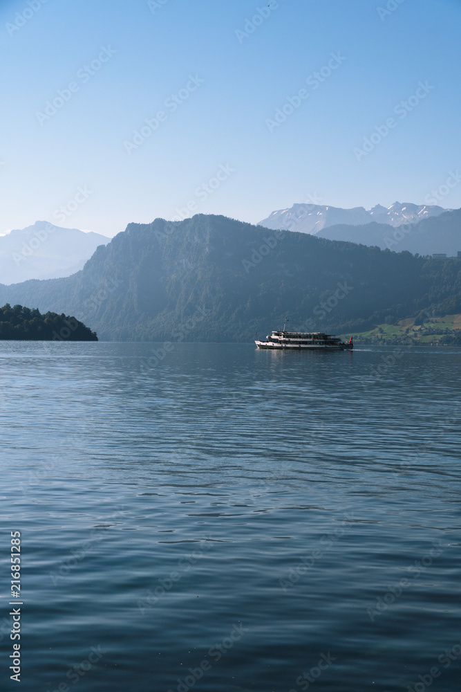 view of Lake Lucerne, the summer season, boats and ships, travel and vacation to Europe concept, Luzern, Switzerland, vertical photo view of Lake Lucerne, the summer season, boats and ships, travel and vacation to Europe concept, Luzern, Switzerland, vertical photo