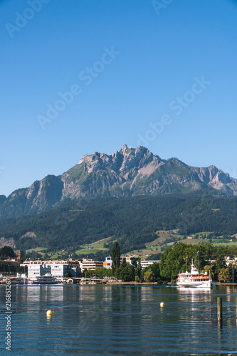 view of Lake Lucerne, the summer season, boats and ships, travel and vacation to Europe concept, Luzern, Switzerland, Pilatus mountain, vertical photo