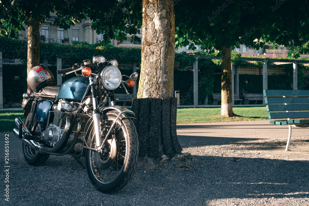two classic style cafe racer motorcycle at sunset time. Bike custom made in vintage. Brutal fun urban lifestyle two classic style cafe racer motorcycle at sunset time. Bike custom made in vintage. Brutal fun urban lifestyle