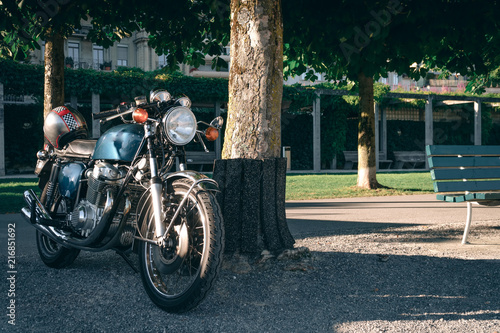 two classic style cafe racer motorcycle at sunset time. Bike custom made in vintage. Brutal fun urban lifestyle photo