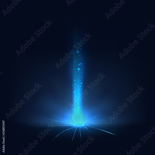 A beam of blue light from a crack in the ground