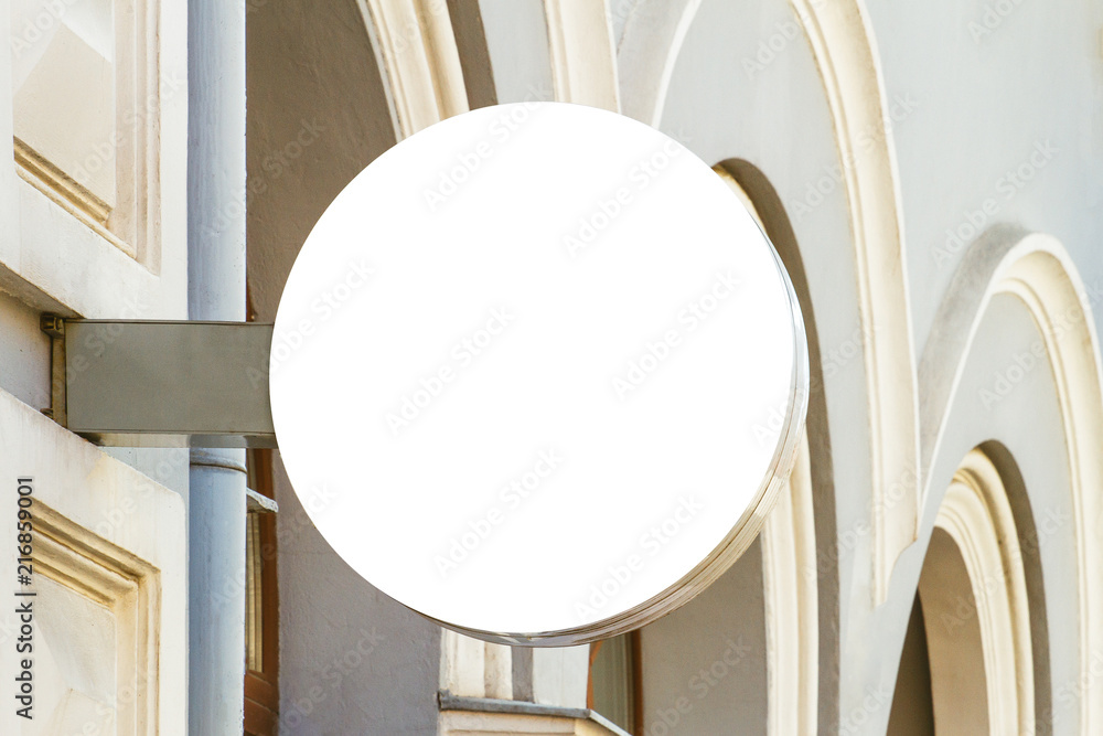Mock up. Round shape signboard on classical architecture building ...