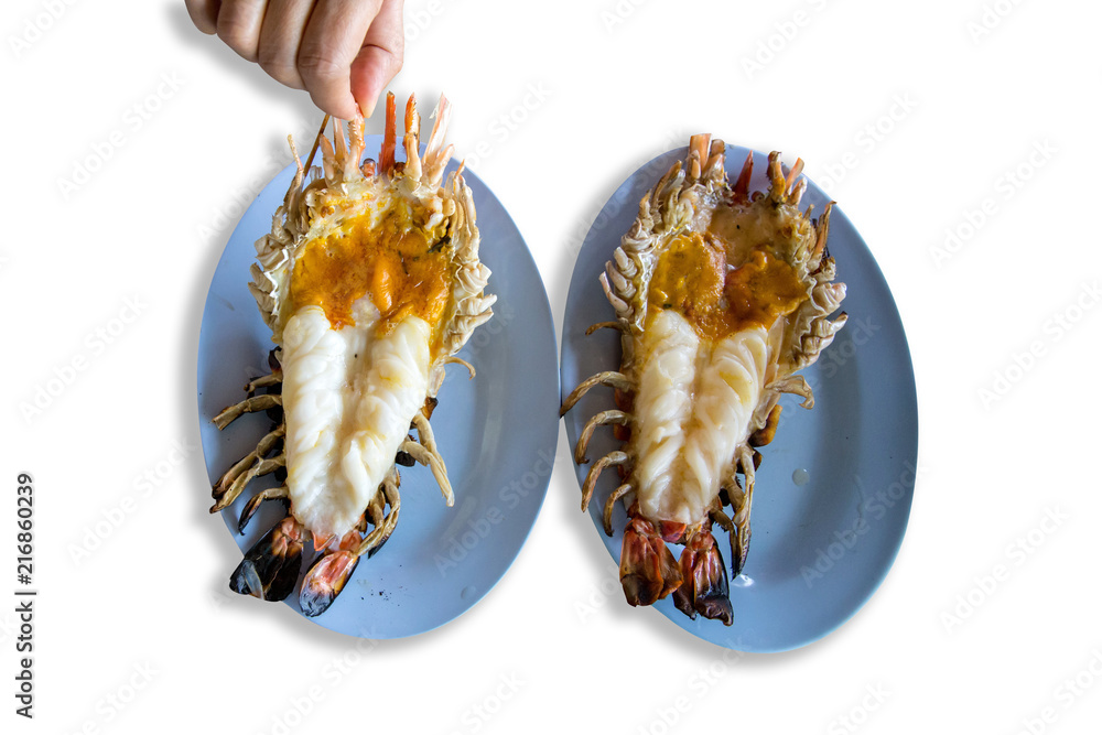 Roasted grilled giant river shrimp or prawn on blue plate, Thai style food in the white background Roasted grilled giant river shrimp or prawn on blue plate, Thai style food in the white background
