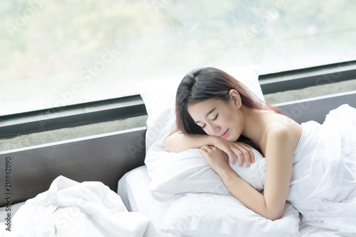 Young beautiful woman sleeping comfort Pillow on clean bed © pongsakorn_jun26