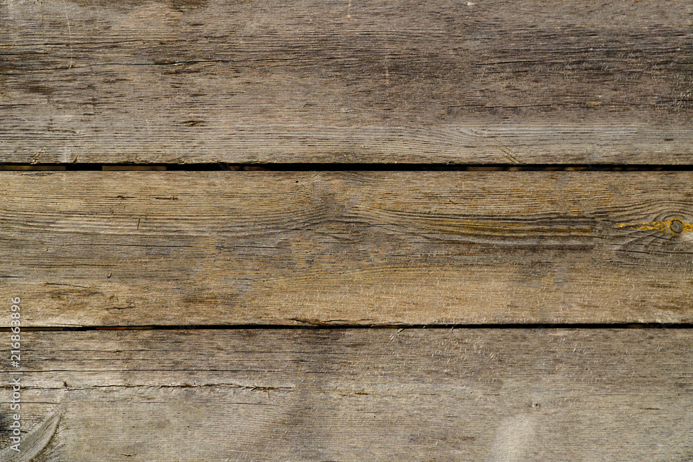 Fototapeta premium Wooden background of pine boards of natural color