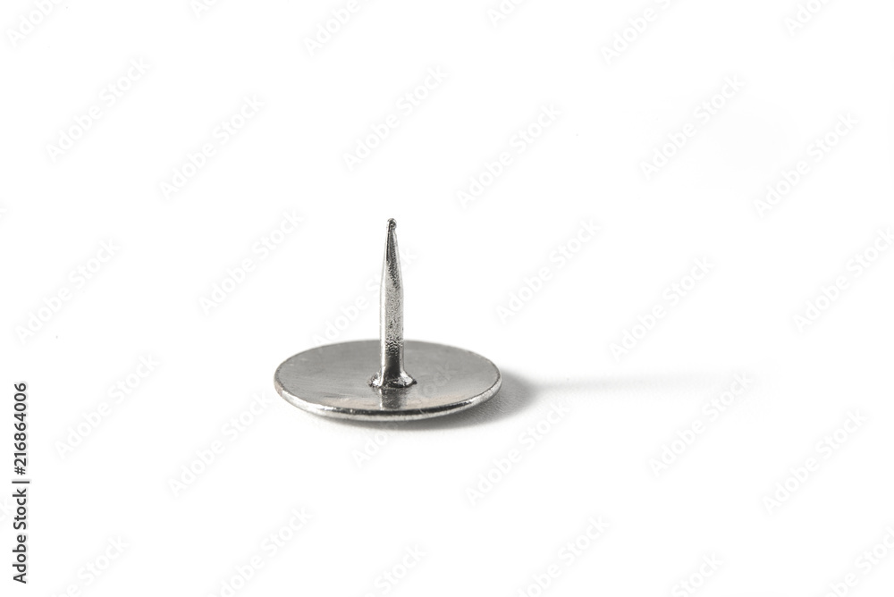 Old thumb pin isolated on the white background Old thumb pin isolated on the white background