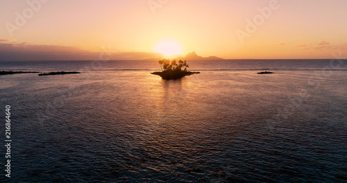 sunset on an islet in French Polynesia © Fly_and_Dive