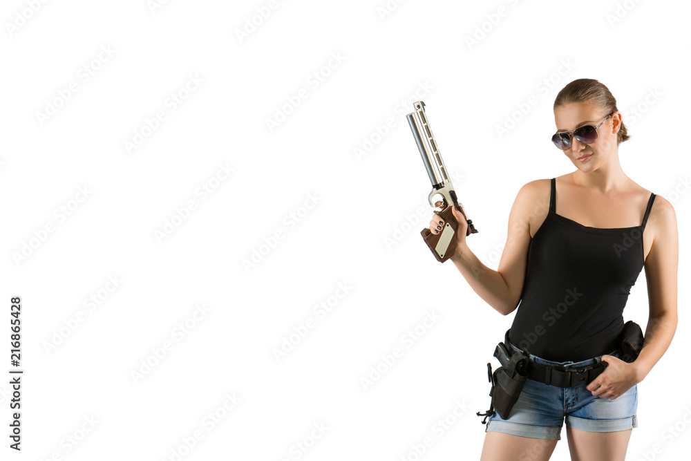 Young beautiful woman holding a sport gun on white background