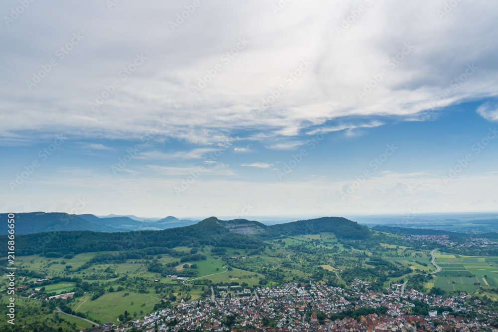 Obraz premium Germany, Endless landscape view over village Neuffen and green mountains