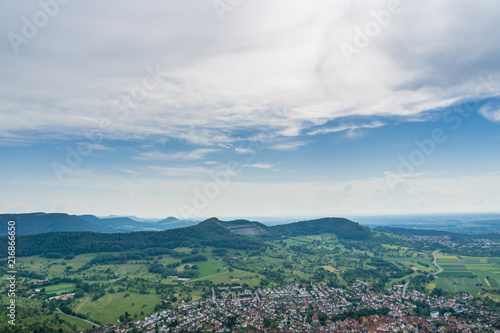 Germany, Endless landscape view over village Neuffen and green mountains