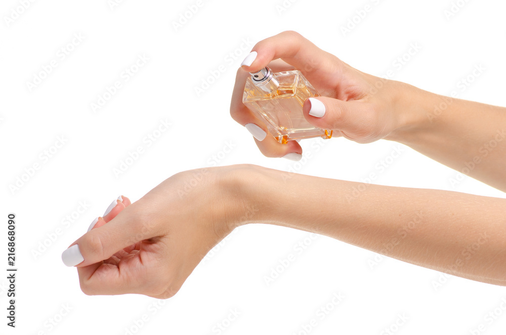 Perfume bottle in hand on white background isolation Perfume bottle in hand on white background isolation