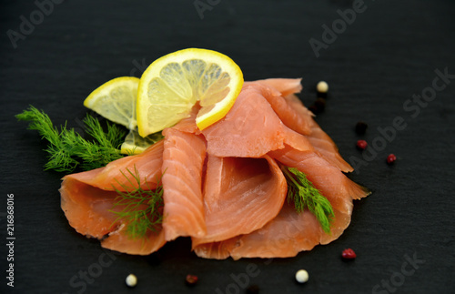 Smoked Salmon slice with dill and lemon