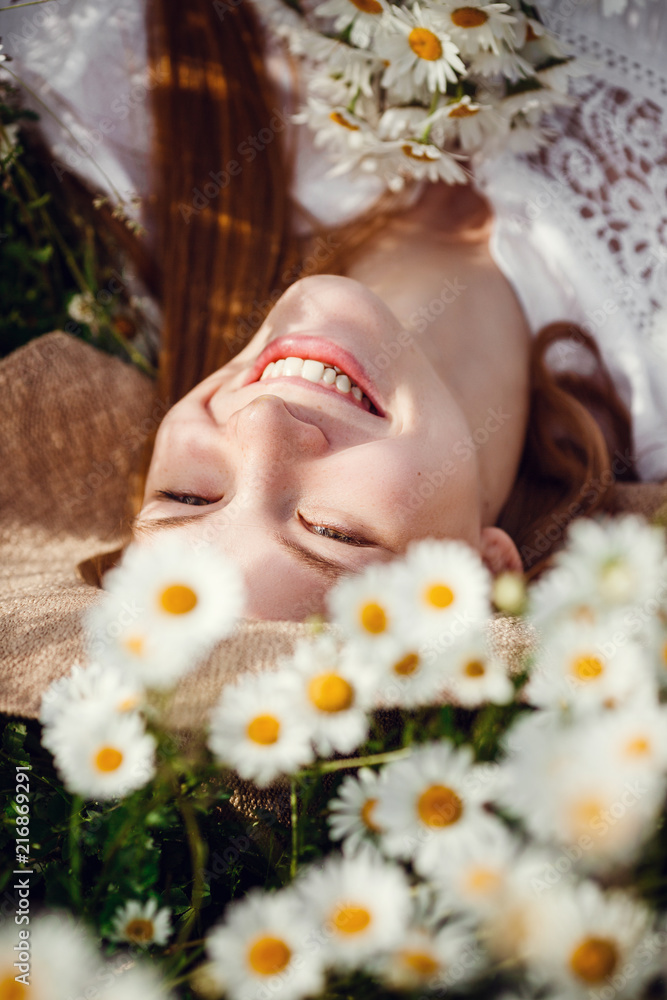 Young red-haired traveler in fairy-tale beautiful scenery. Young red-haired traveler in fairy-tale beautiful scenery.