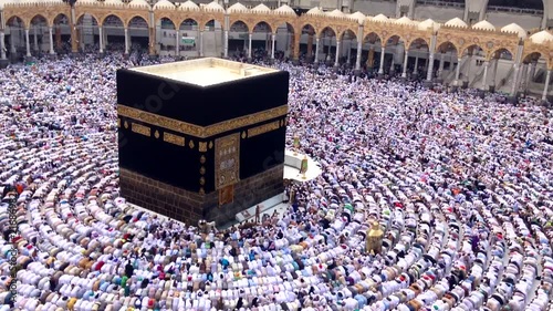 Praying at holy house kaaba photo