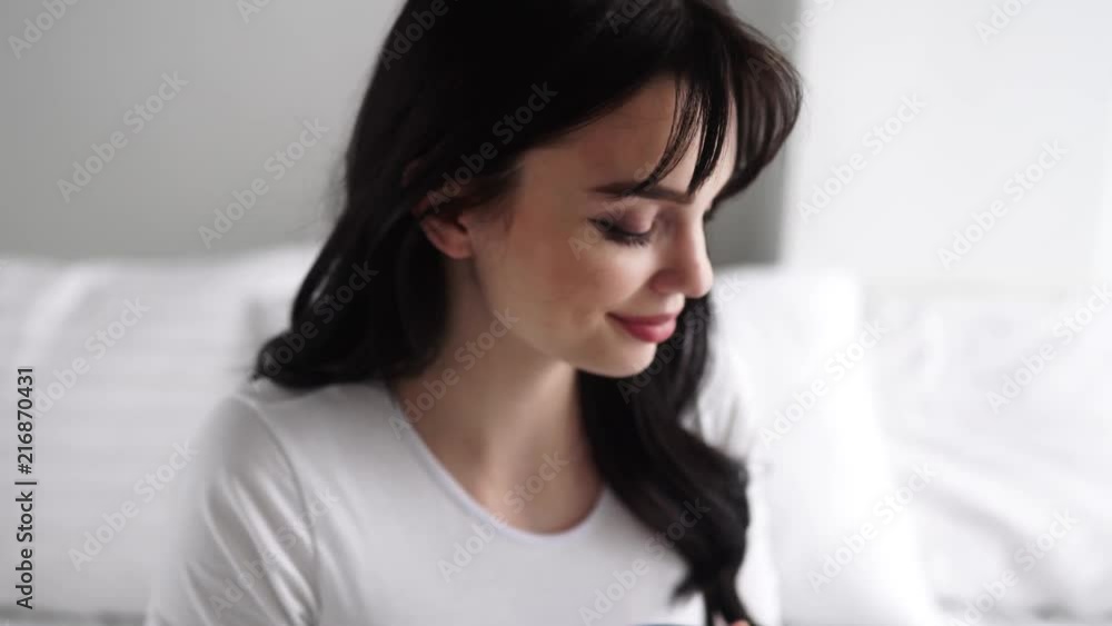 Pregnant Young Woman Drinking Tea And Sitting On Bed At Home Pregnant Young Woman Drinking Tea And Sitting On Bed At Home