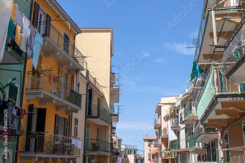 Cinque terre - sky and street with buildings © monochrome.colors