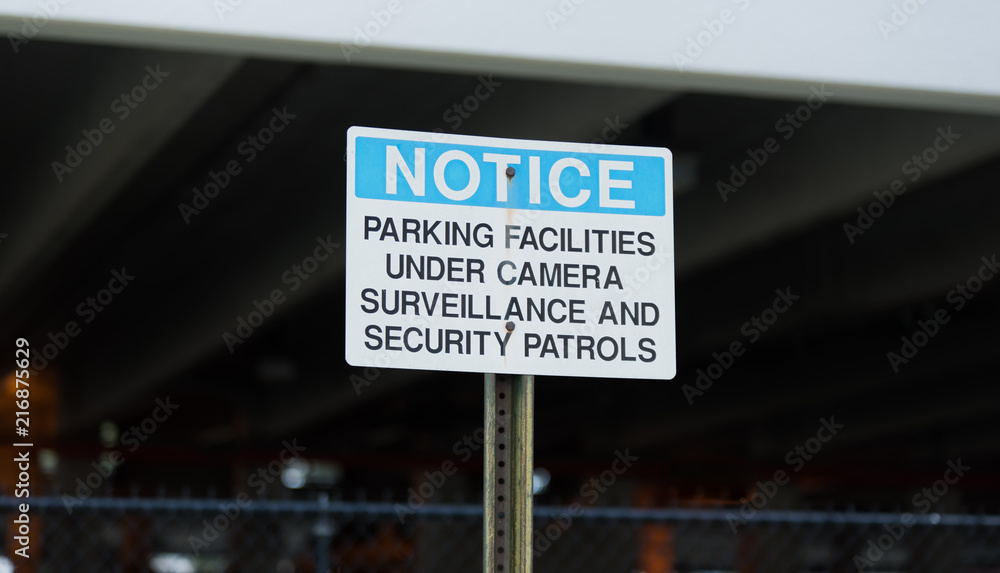 Notice Parking Facilities Under Camera Surveillance Sign