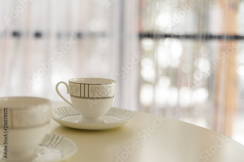 Two cups for tea on the table. Bokeh and blurred background. Selective focus. Copy space.