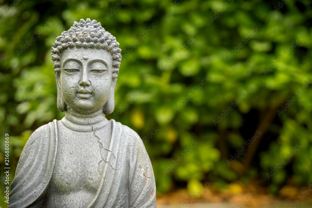 peaceful buddha in green garden peaceful buddha in green garden