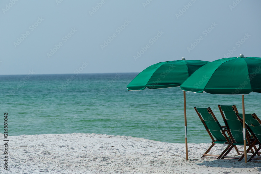 beach chairs and umbrella gulf coast Florida beach relaxation