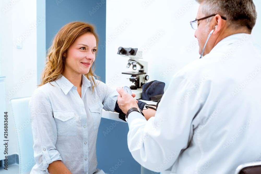 Offering his expert advice to his patient Offering his expert advice to his patient