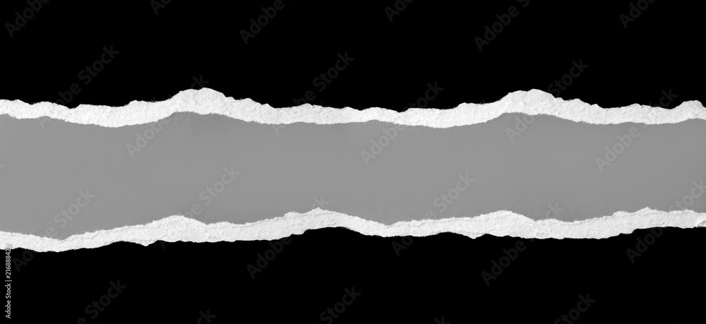 Ripped black paper on gray background banner Ripped black paper on gray background banner