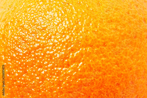 Mandarin, mandarine, tangerine orange skin texture close up details. Pimples