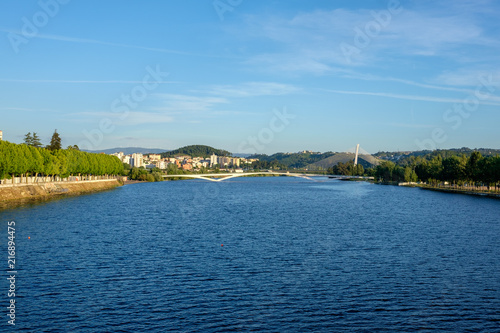 Ponte Rainha Santa Isabel bridge over river Mondego in Coimbra, Portugal.