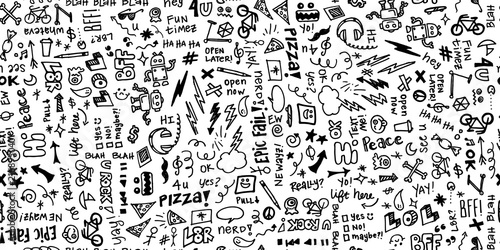 Seamless hand drawn school note doodles pattern in black and white. photo