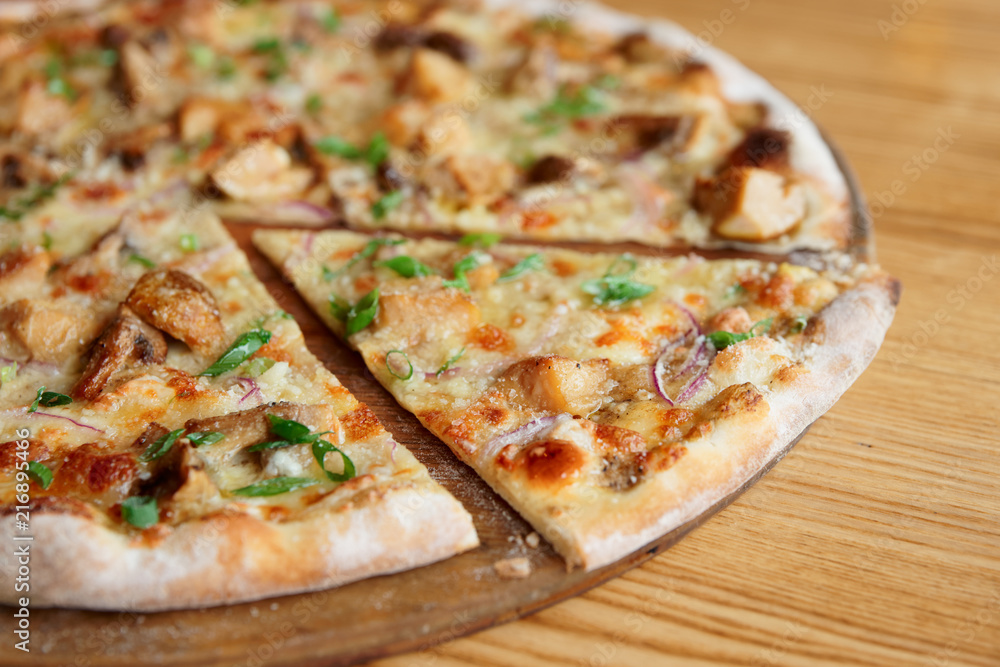 Pizza with porcini mushrooms, close-up Pizza with porcini mushrooms, close-up