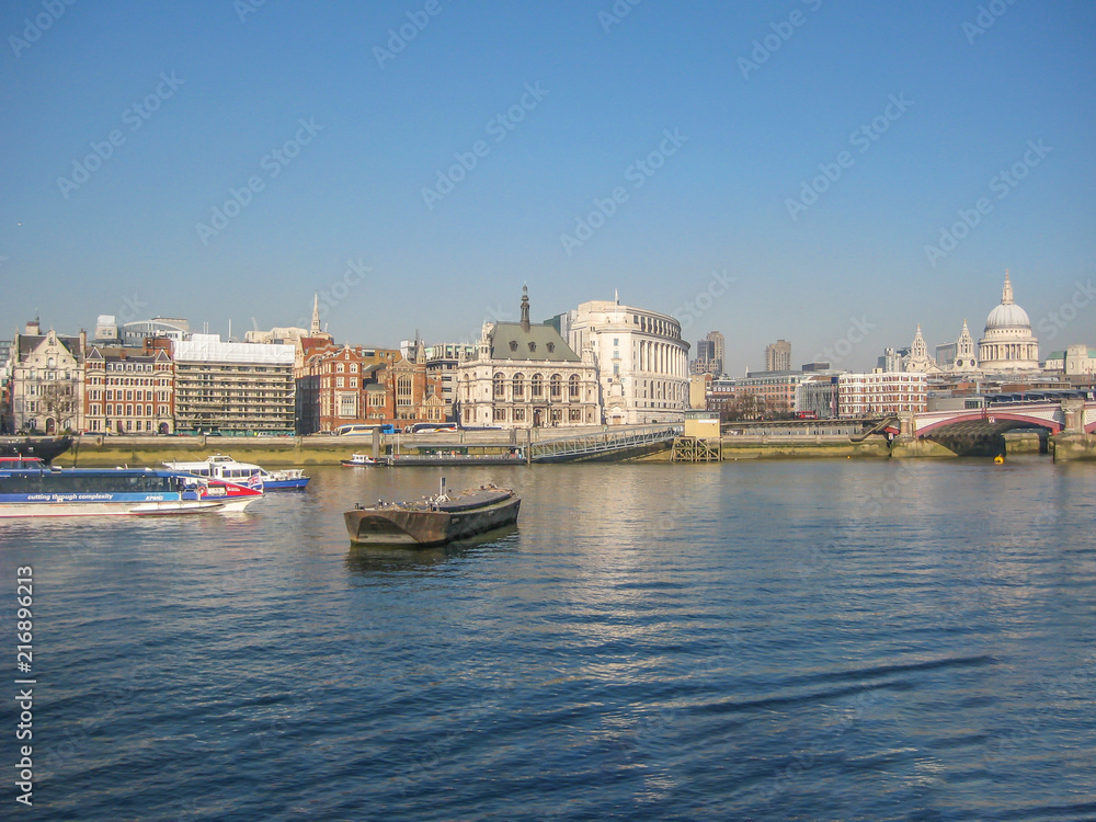 View of the banks of the River Thames, in London, UK