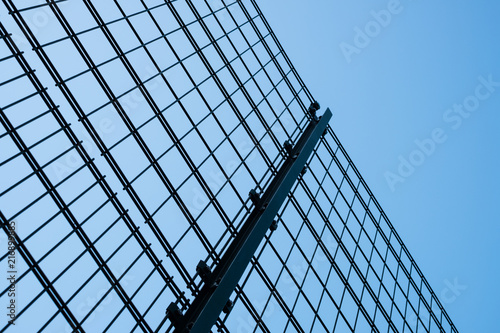metal fence construction on blue sky 