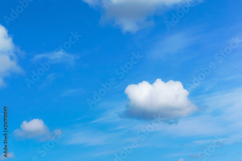 Blue sky and white clouds. White clouds on blue background.