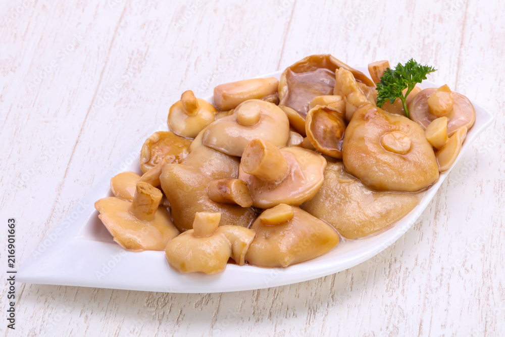 Pickled mushrooms in the bowl Pickled mushrooms in the bowl