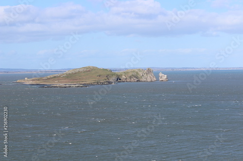 Photography rock in the sea close howth, dublin, ireland