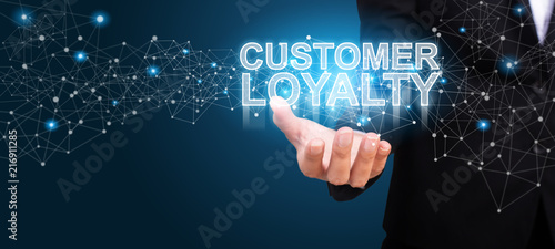 Businessman showing Customer Loyalty. Customer Loyalty concept photo