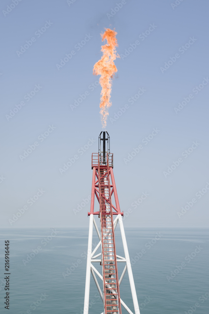 Flare boom on offshore oil rig. Stock Photo | Adobe Stock