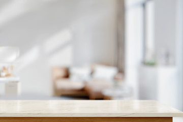 White marble top table for display montage over bright living room background.