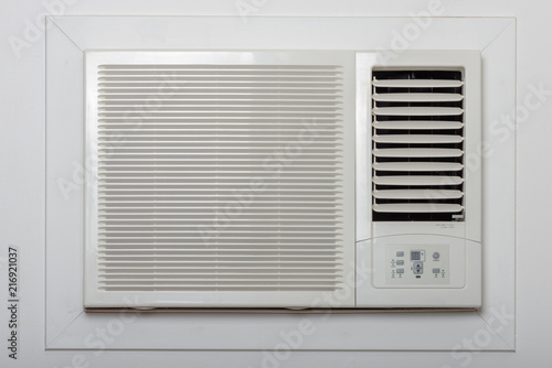 Photography And old styled air conditioner on the wall.