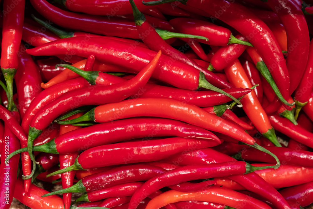 Fresh red chillies background.