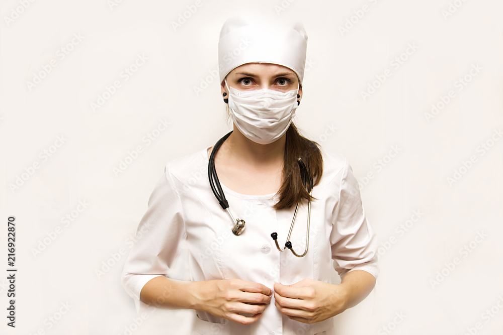 medical sister in white coat, hat and oil on face, stethoscope on neck, isolate on white background medical sister in white coat, hat and oil on face, stethoscope on neck, isolate on white background
